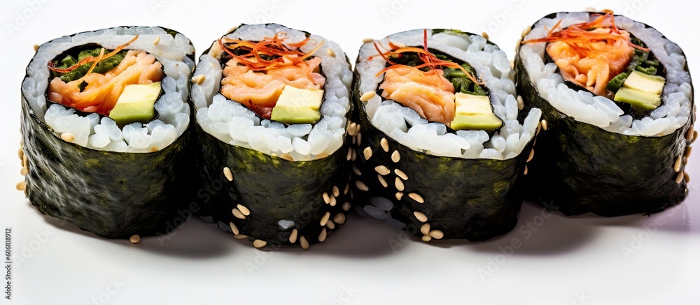 Sushi, a traditional Asian dish, features rolls with avocado, pickled ginger, and soy sauce, wrapped in nori seaweed. Sushi, a traditional Asian dish, features rolls with avocado, pickled ginger, and soy sauce, wrapped in nori seaweed.