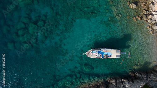 Amazing aerial view of mediterranean bay with boat.  © Tarik GOK