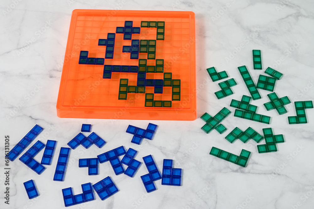 Naklejka premium Board game with figures similar to tetris.