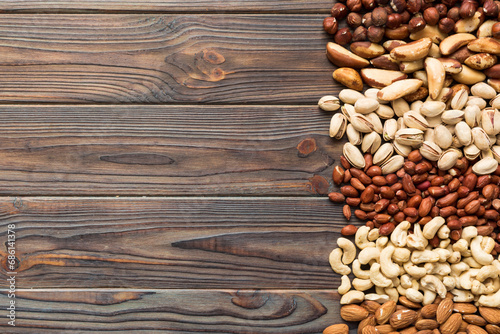 different nuts frame background. Close up  top view  flat lay with vopy space. Walnut  pistachios  almonds  hazelnuts and cashews