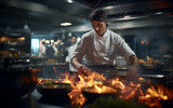 Chef Flambeing Food in Busy Restaurant Kitchen