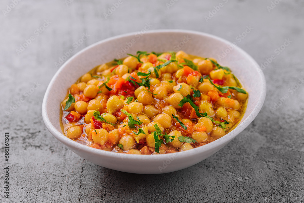 Cooked chickpeas in a white bowl Cooked chickpeas in a white bowl