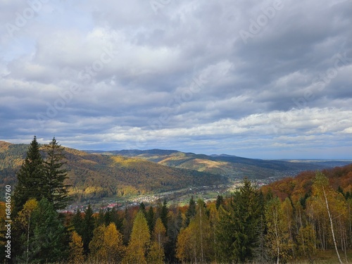 Autumn in the mountains. View of the forest and mountains. Panorama in the Carpathians Ukraine