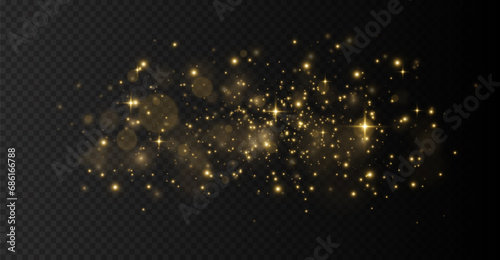 Christmas glowing dust background, the light of gold dust, bokeh light effect background, Yellow flickering glow with confetti bokeh light and particle motion. The dust sparks and golden stars shine.