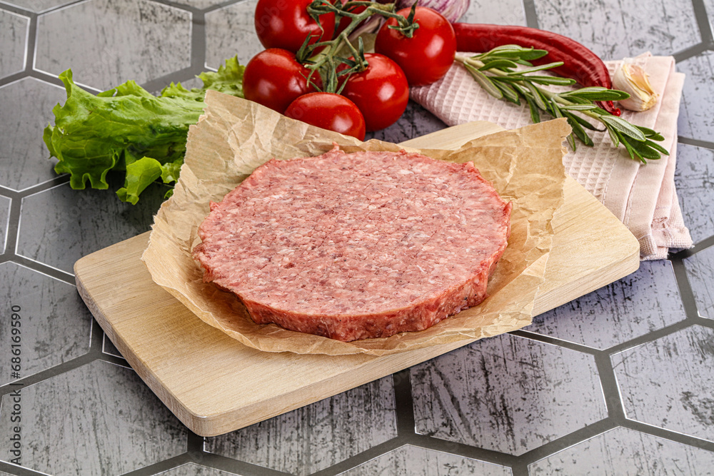 Raw beef uncooked burger cutlet