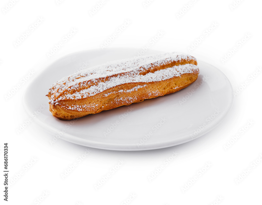 eclair with powdered sugar on a plate
