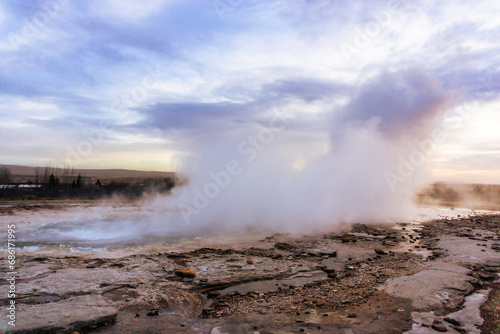 Strokkur geyser Geothermal geysir area in golden circle Iceland in autumn