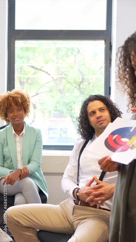 custom made wallpaper toronto digitalWoman advising an african colleague during a meeting in a coworking