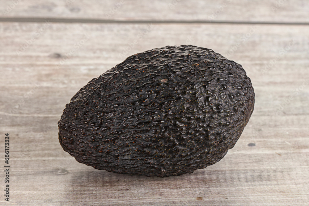 Fototapeta premium Ripe raw whole avocado fruit