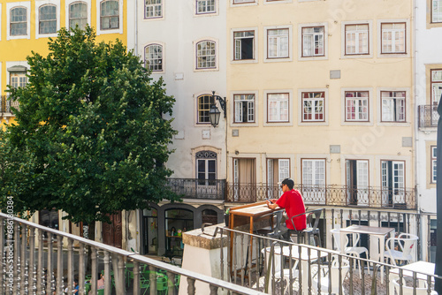 Townscape with man, Coimbra, Portugal