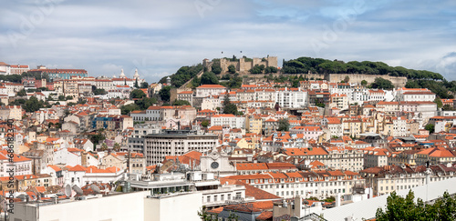 Panoramic view of the roofs of the Alfama district with St. George's Castle in the background (Lisbon)