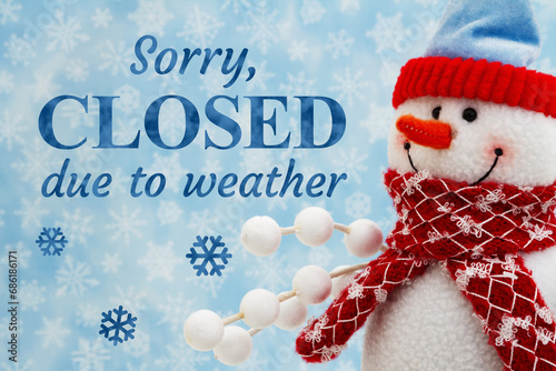 Sorry closed due to weather with a snowman with snowflakes