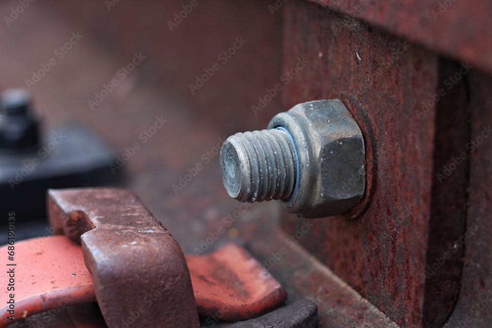 High resolution rusty bolts and screws on abandoned railroad train track High resolution rusty bolts and screws on abandoned railroad train track
