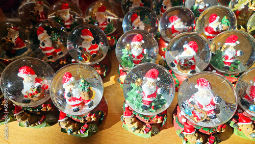 Christmas glass balls with snow and Santa Claus inside. waiting for Christmas
