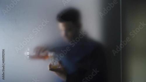 Young man addicted to alcohol. photo