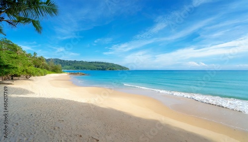 beautiful sandy beach and sea with clear blue sky background amazing beach blue sky sand sun daylight relaxation landscape view in phuket island thailand for summer and travel background © Mary