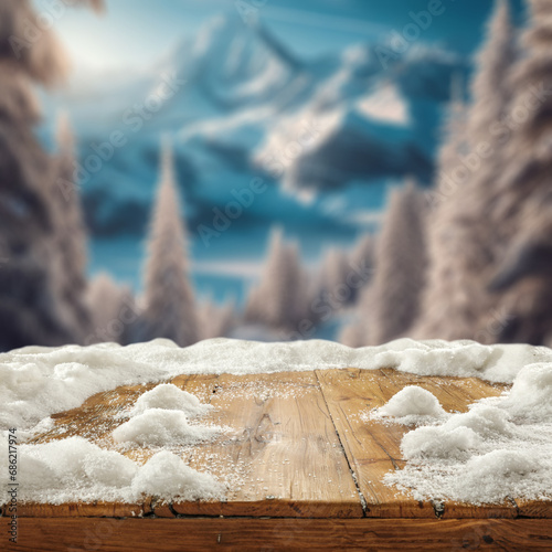 Wooden table cover of snow and frost. Empty space for your decoration. Christmas magic time and landscape of mountains. Natural light and rural view.  © magdal3na