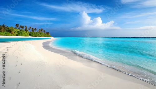 beautiful sandy beach with white sand and rolling calm wave of turquoise ocean on sunny day on background white clouds in blue sky island in maldives colorful perfect panoramic natural landscape © Mary