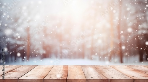 Empty wooden brown  table in beautiful blurred winter landscape, wood plank board with snowflakes and fog. horizontal background or wallpaper, copy space 