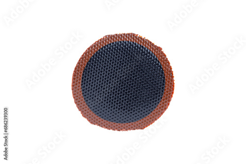 round plasters for tire repair,  plasters for repairing tire punctures isolated from background