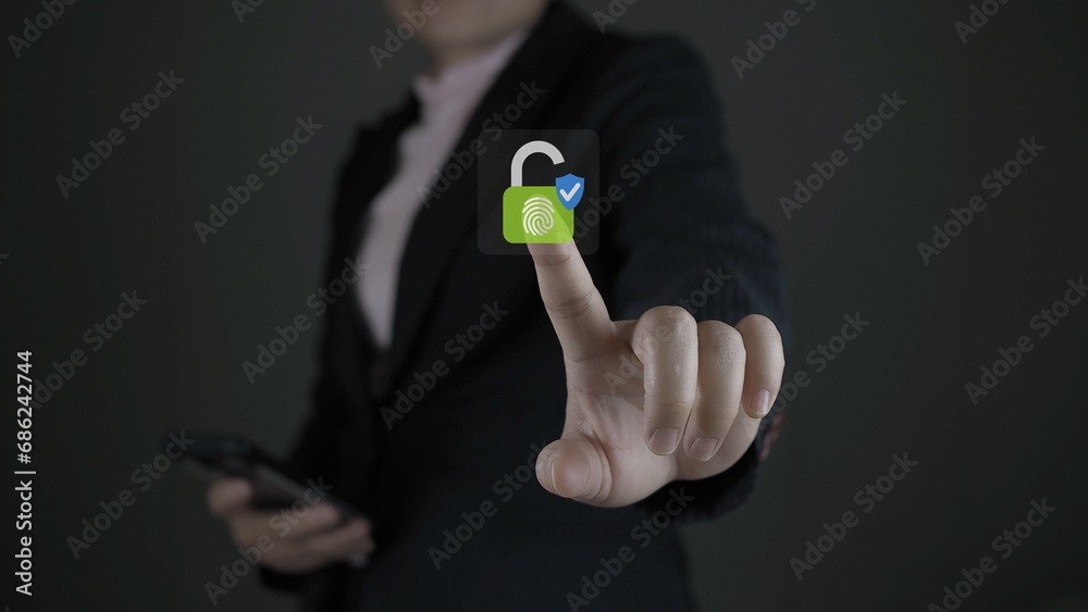 Fototapeta premium Cyber security concept, Login, User, identification information security and encryption,Businessman using mobile phone with padlock and key icon screen, Data Security system concept