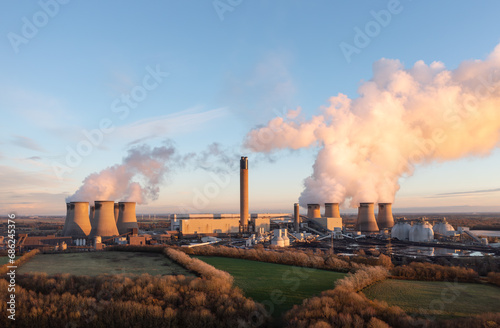 coal fired power station in UK with coal stack and biofuel storage tanks for clean energy production photo