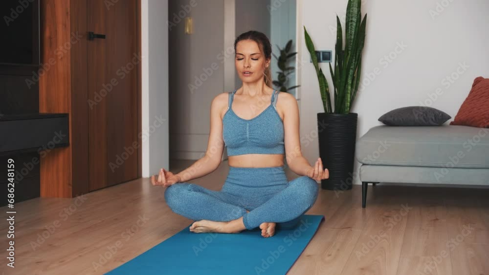 happy active woman doing sports training at home living room on mat floor uses phone online lesson. Fashion model Girl doing exercises dog for leg hand muscle stretching. sport fit yoga workout gym 4k happy active woman doing sports training at home living room on mat floor uses phone online lesson. Fashion model Girl doing exercises dog for leg hand muscle stretching. sport fit yoga workout gym 4k