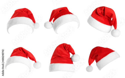 Red Santa Claus hat isolated on white, set