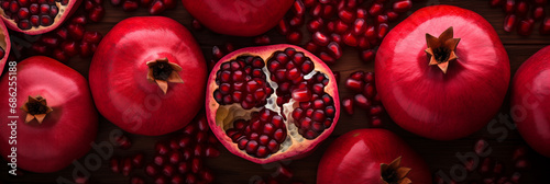 A vibrant backdrop showcasing the rich hues of ripe pomegranate photo