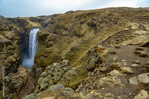 waterfall in the mountains photo