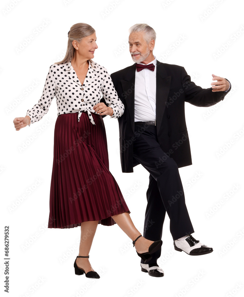 Senior couple dancing together on white background Senior couple dancing together on white background
