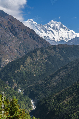 View of Everest and Lhotse mountains during trekking in Nepal in a clear day. EBC or Three passes trekking in Nepal. Mountain range Himalayas in the Khumbu region of Nepal, Asia.