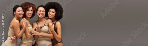 appealing happy african american women in comfy underwear having great time together, banner