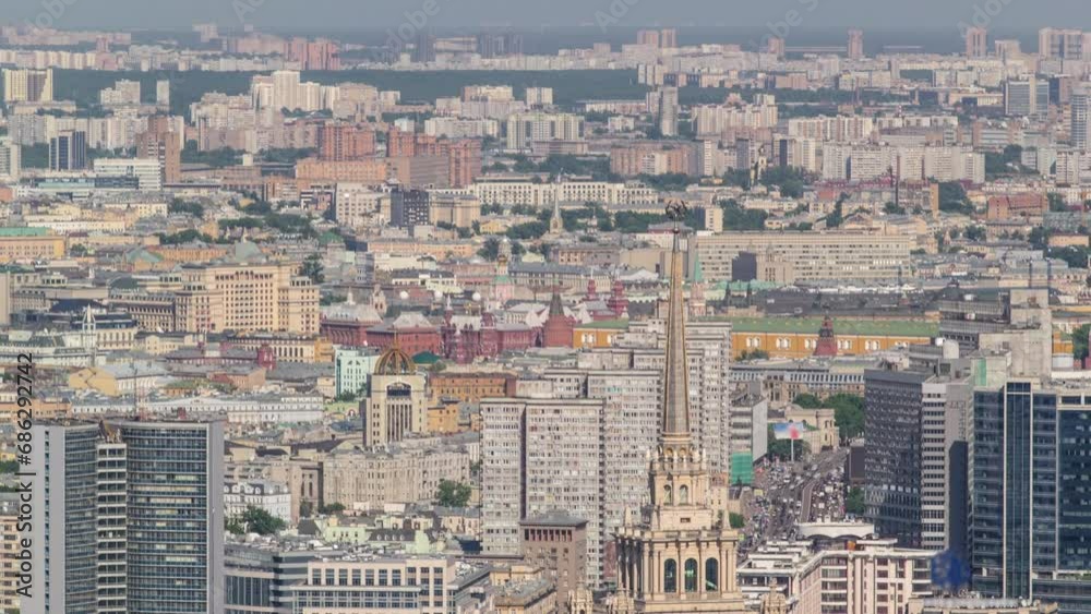 Panoramic aerial view from Skyscrapers of Moscow City business complex timelapse from top. Former hotel Ukraine and residential buildings with kremlin and historic museum Panoramic aerial view from Skyscrapers of Moscow City business complex timelapse from top. Former hotel Ukraine and residential buildings with kremlin and historic museum