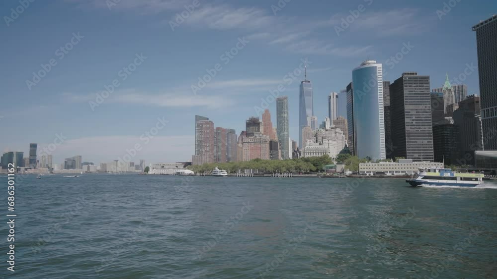 48 FPS_NYC_Ferryboat Ride_East River Bay_Handheld Wide Shot_Ferryboat Entering Frame Right, FiDi, World Trade Center, Manhattan Skyline in Background