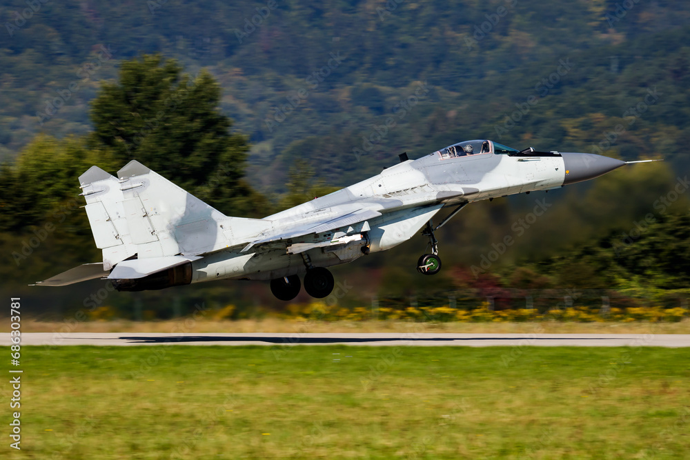 Military fighter jet plane at air base. Airport and airfield. Air force flight operation. Aviation and aircraft. Air defense. Military industry. Fly and flying. Military fighter jet plane at air base. Airport and airfield. Air force flight operation. Aviation and aircraft. Air defense. Military industry. Fly and flying.