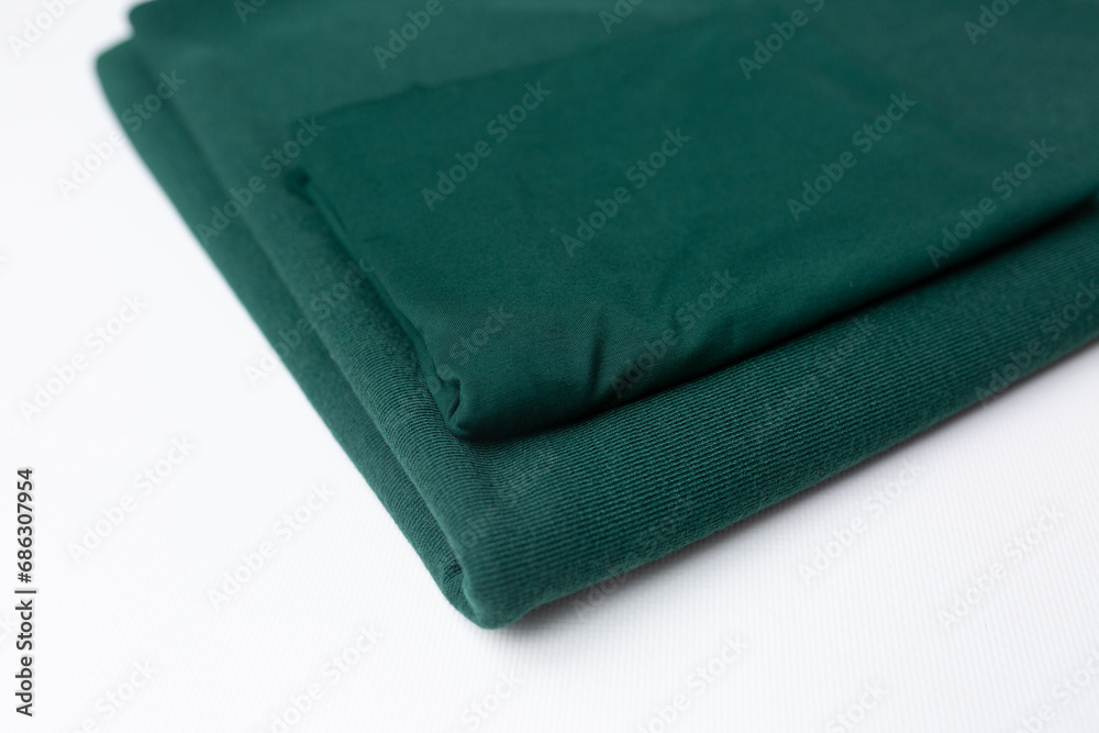 fabric of different colors, fabric laid out on the table fabric of different colors, fabric laid out on the table