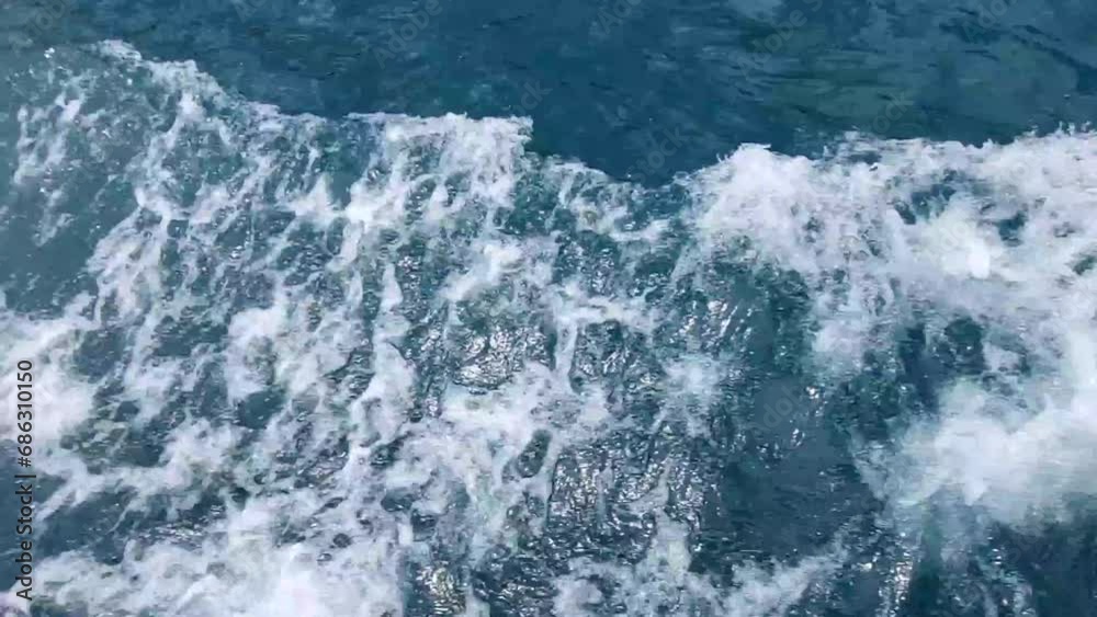 Blue sea waves while sailing on a ship Blue sea waves while sailing on a ship