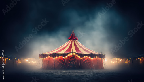 Circus tent with lights garland in night park ,concept carnival