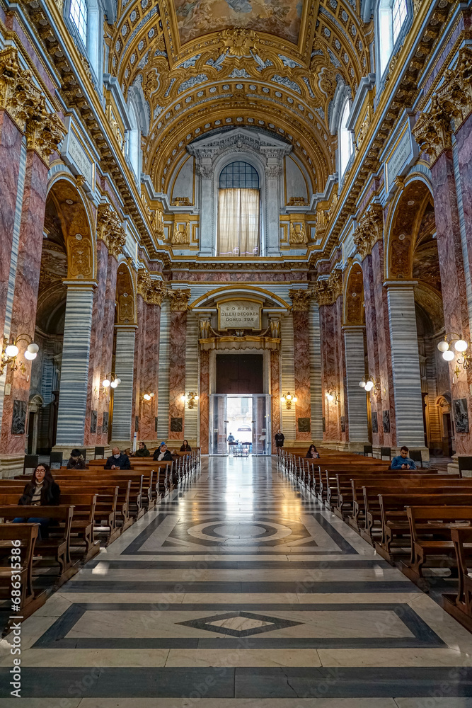 rear nave facing the doorway inside the basilica SS Ambrogio e Carlo in the center of the italian city of Rome