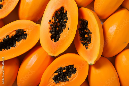 Fresh open papaya background arranged together representing healthy diet concept photo