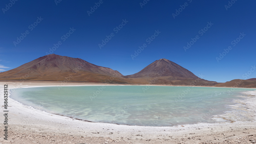 Bolivia, Verde Lagoon, Avaroa National Park. Beautiful lake with green toxic water. Panorama. Bolivia, Verde Lagoon, Avaroa National Park. Beautiful lake with green toxic water. Panorama.