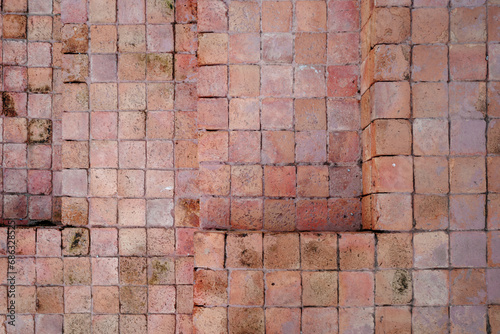 Brick with square shape arrange on grid pattern.