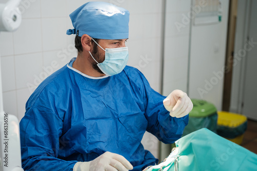 Surgeon in full surgical intervention performing a sterile operation. Concept  medicine  health care