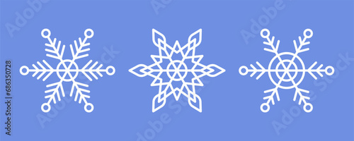 White Snowflakes on blue background. Vector Winter isolated icons in silhouette. Snow Cristals. Simple Line Style