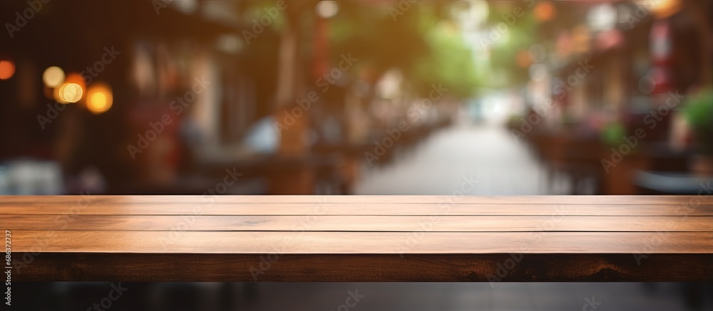 Table in front of coffee shop for displaying products Table in front of coffee shop for displaying products