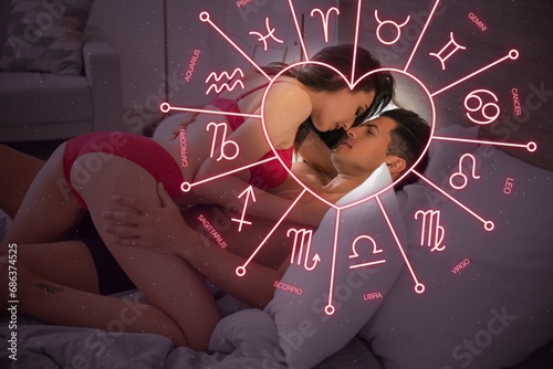 Passionate young couple in bed. Sexual compatibility horoscope