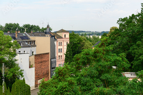 View of city with buildings and trees