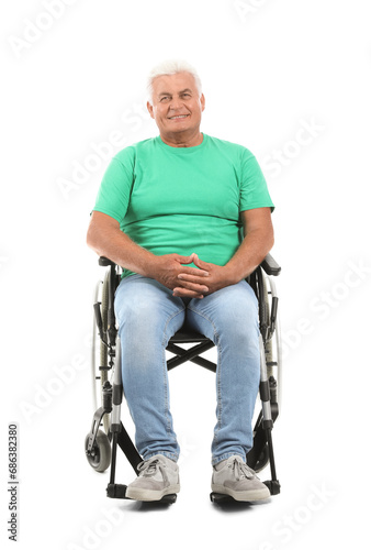 Mature man in wheelchair on...