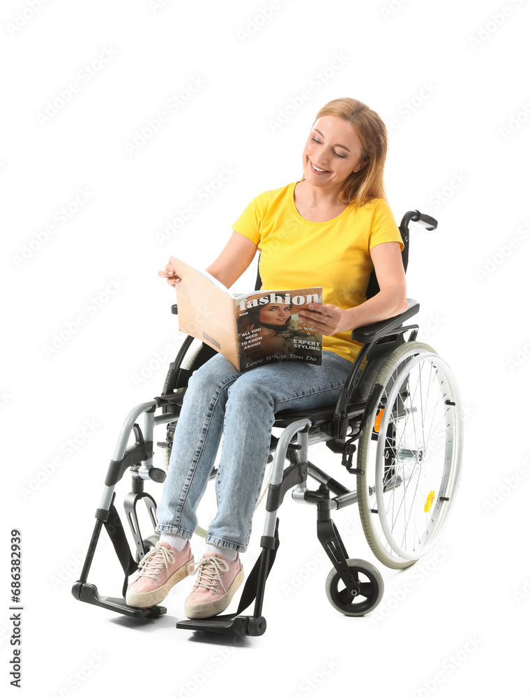Mature woman in wheelchair reading magazine on white background Mature woman in wheelchair reading magazine on white background